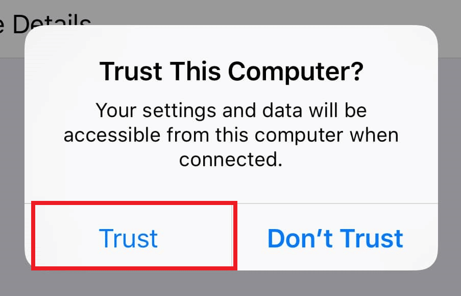 点击屏幕上“信任此计算机”弹出窗口的“信任”选项